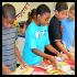 students receive new braille books at ocho book fair