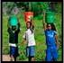 children in tanzania carry water