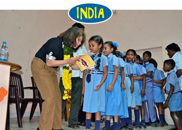 Girls get their books at the Rotary Club in Gudur, India