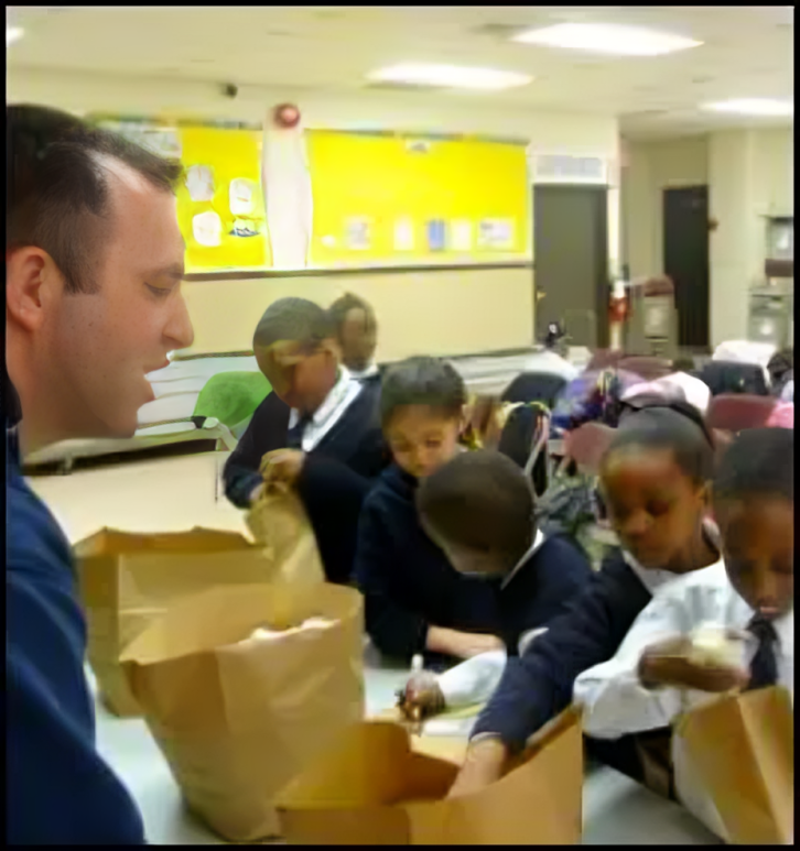 A group of children are eating lunch at school.